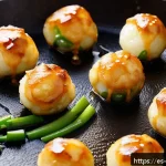 오사카 타코야키 제대로 만드는 법 - A close-up of authentic Osaka-style Takoyaki balls cooking in a traditional cast iron Takoyaki pan o...